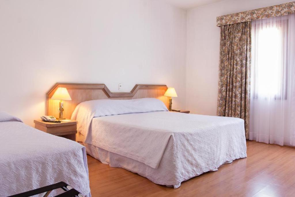 Paradies Hotel Express Жарину Екстериор снимка